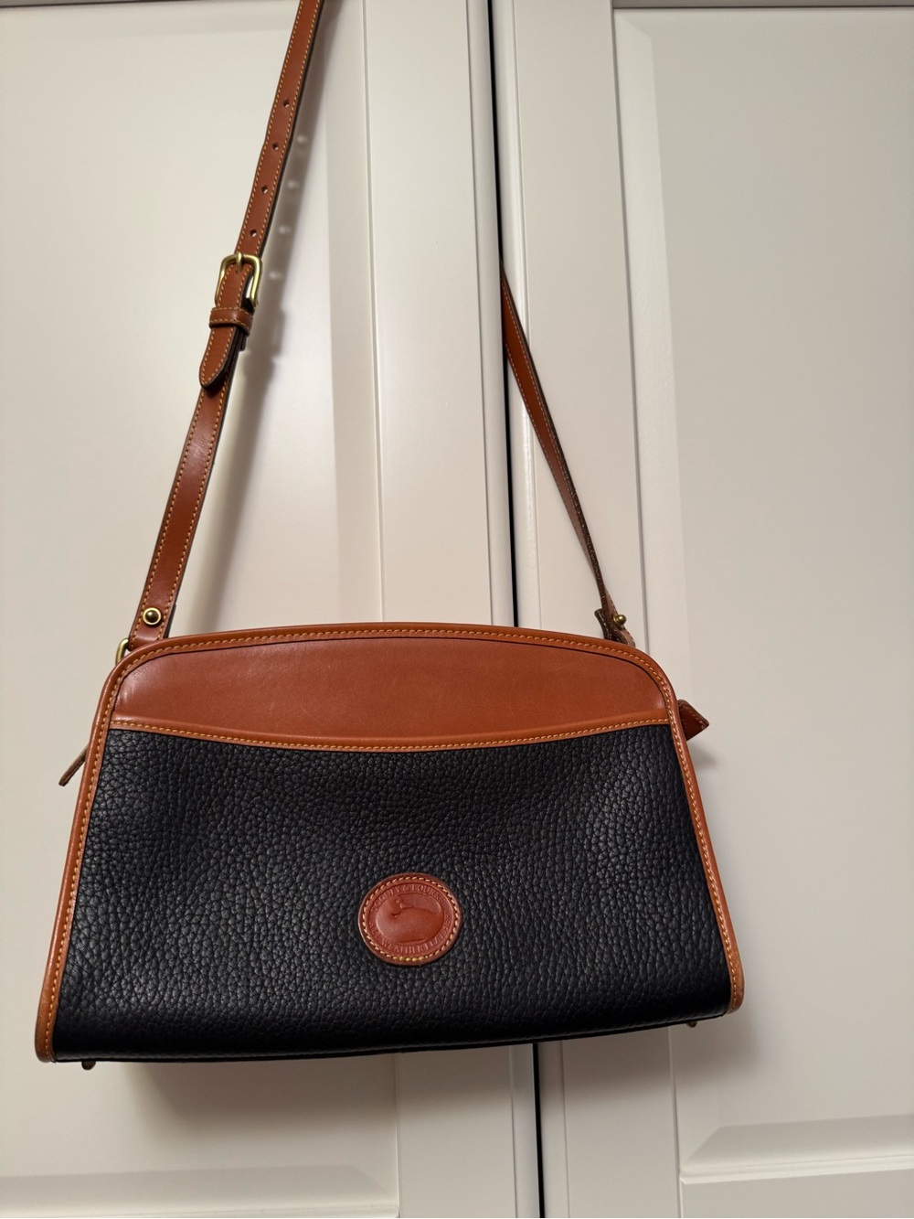 Dooney&Bourke Classic Black and Tan Pebbled Leather Shoulder Bag
